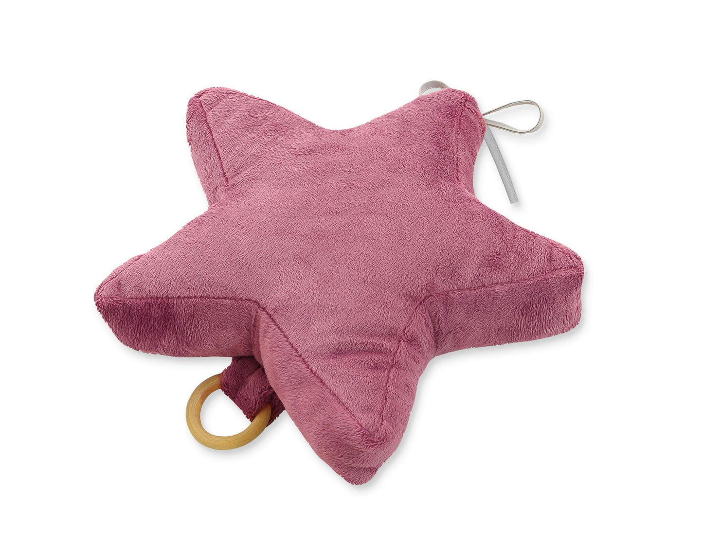 Pink star-shaped pillow with a wooden ring on a white background