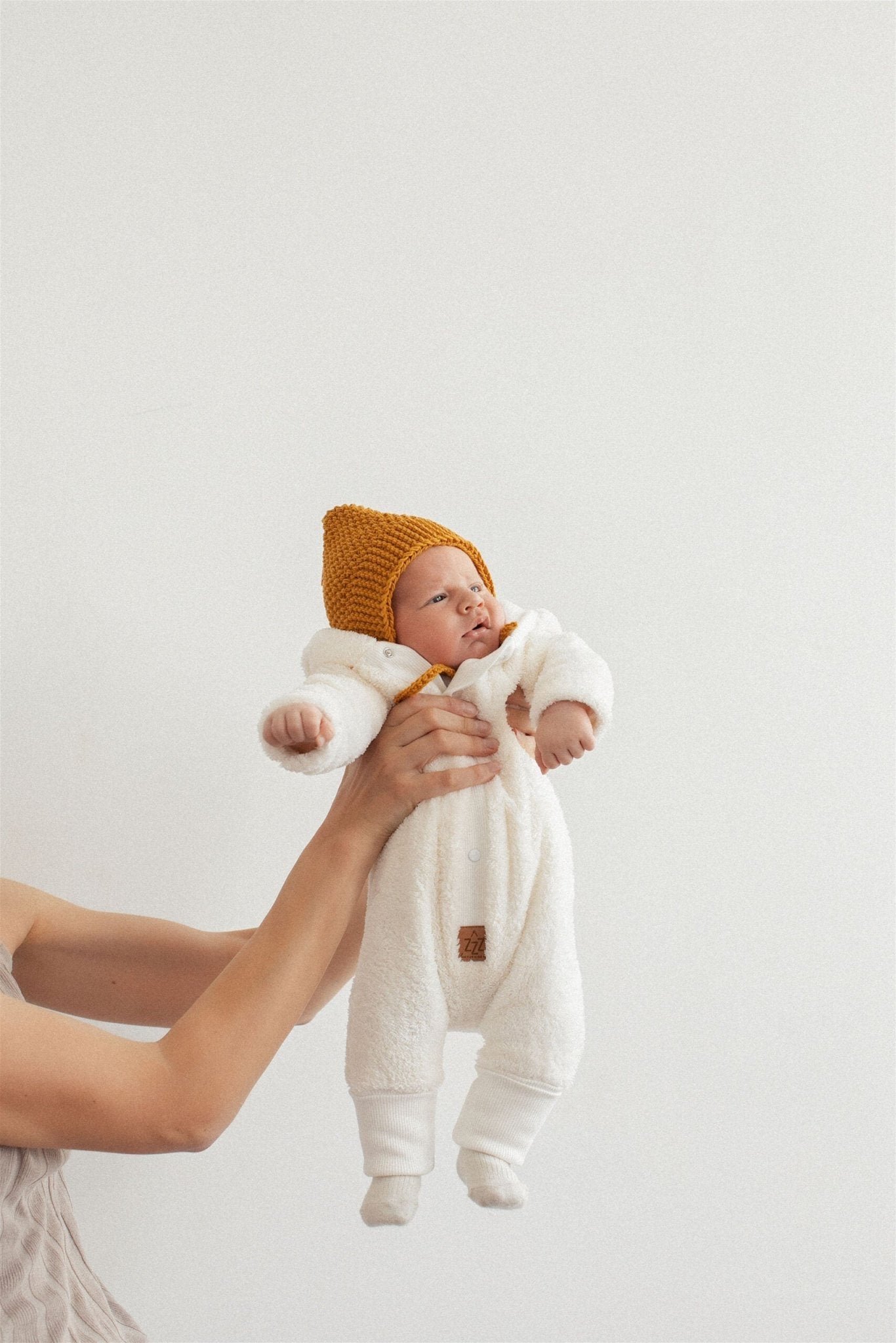 Eared Jumpsuit for Babies and Kids - Fuzzy Ecru - Kindeco