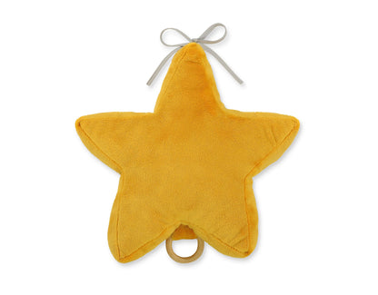 Yellow star-shaped object with a ring on a white background