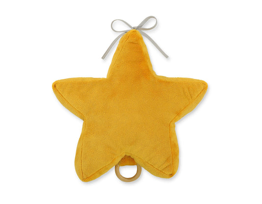Yellow star-shaped object with a ring on a white background