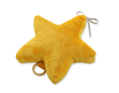 Yellow star-shaped plush toy with a string on a white background